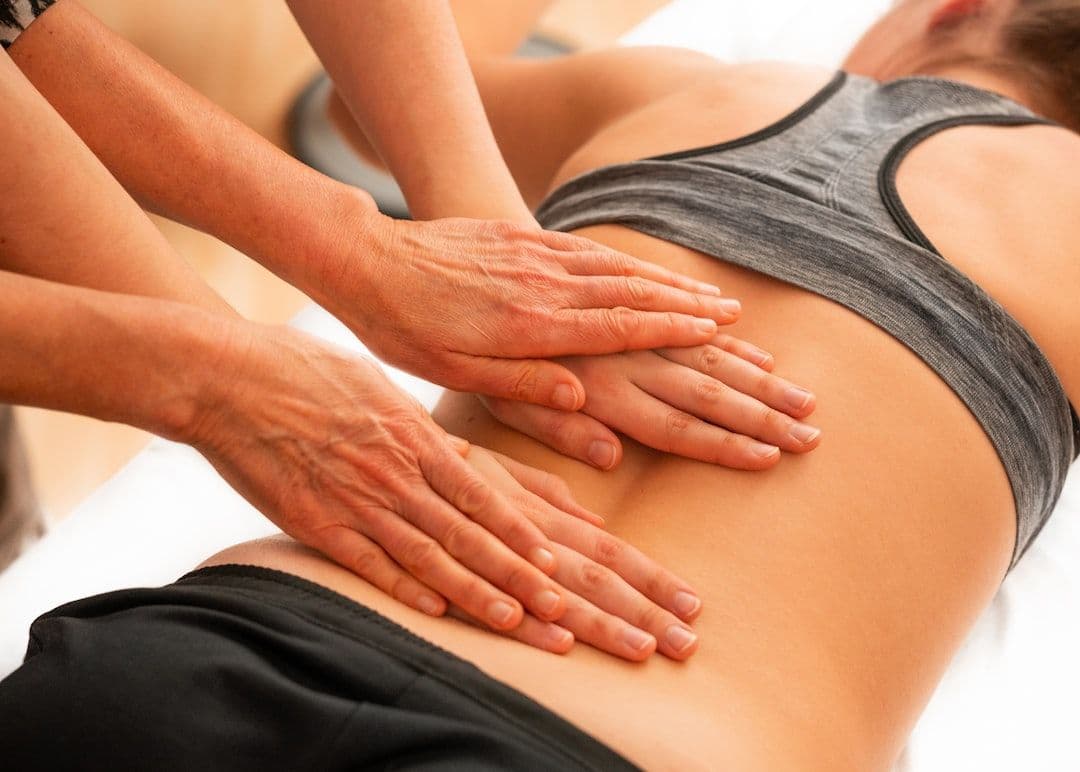Myotherapy for back pain — trigger point release on the lumbar spine