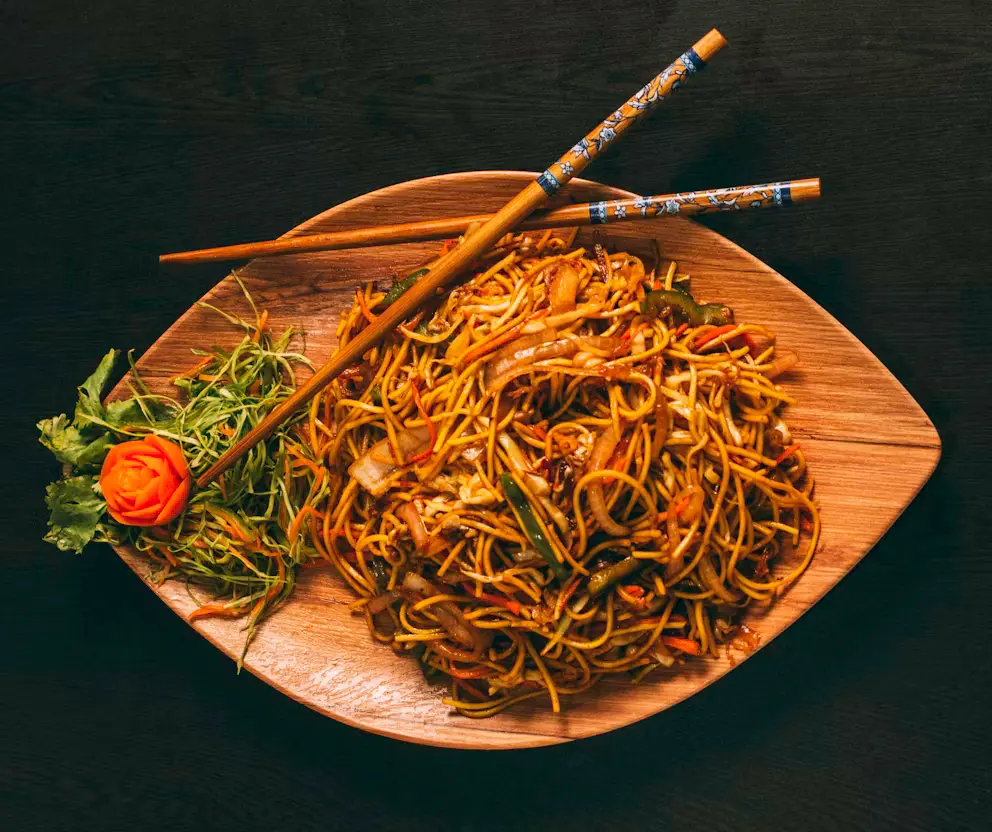 Naturopath reviewing dietary assessment notes with a patient